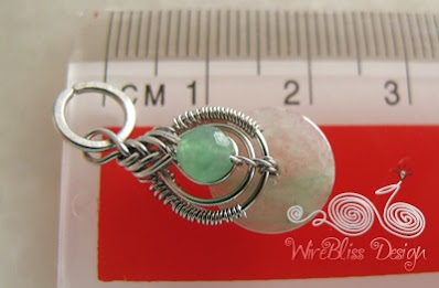 top view of the wire wrapped jade pendant - pipa wrap
